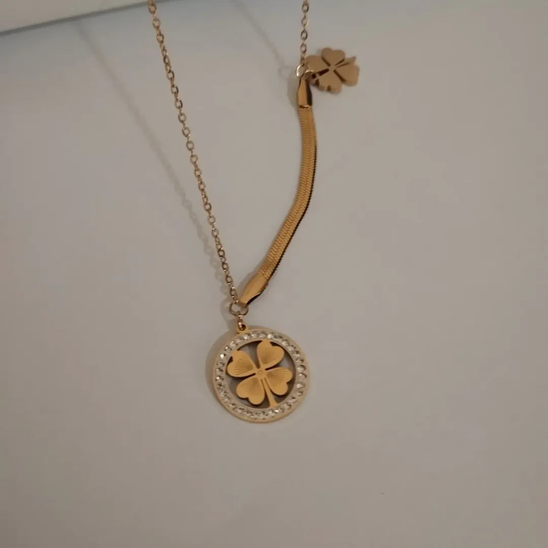 Golden Four-Leaf Clover Necklace with Dazzling Crystal Halo