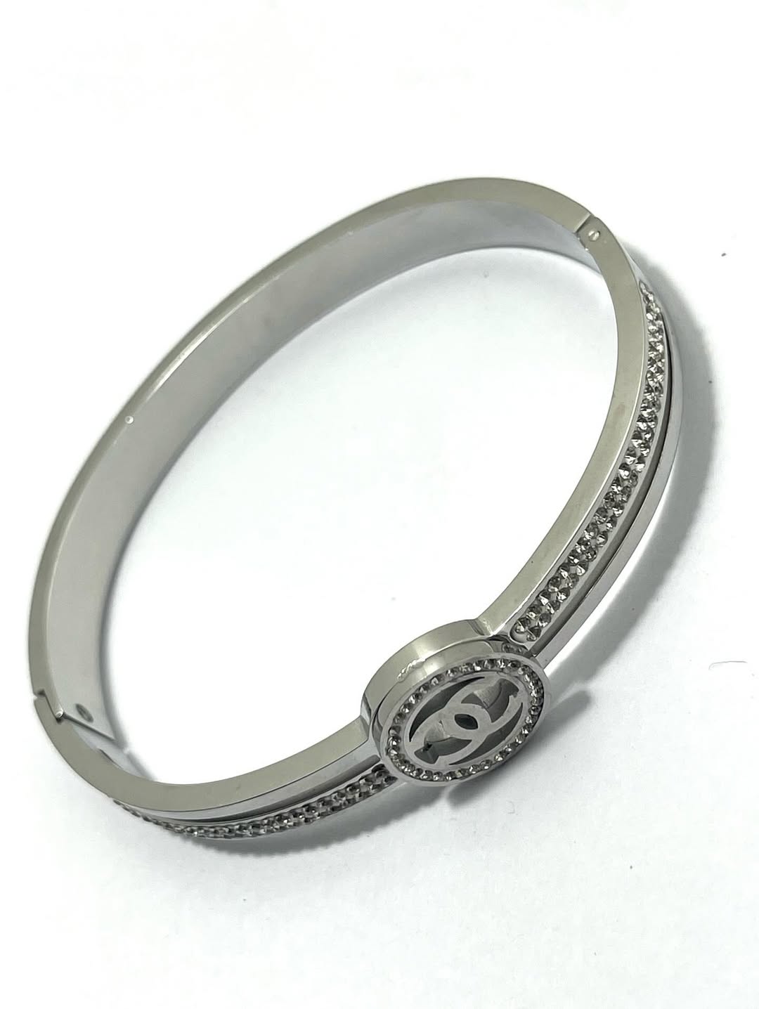 Elegant Silver-Toned Bangle for Women – Crystal-Embellished with Iconic Double C Design
