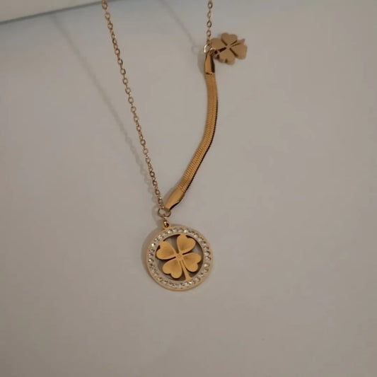 Golden Four-Leaf Clover Necklace with Dazzling Crystal Halo